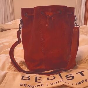 Beautiful RED Bed Stu Eve Bucket Crossbody Bag